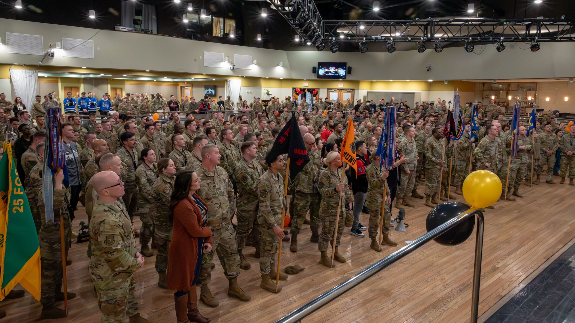 U.S. Air Force Airmen assigned to the 51st Fighter Wing listen to the wing leadership’s closing remarks during the annual awards ceremony at Osan Air Base, Republic of Korea, Feb. 21, 2025. U.S. Air Force Col. William McKibban, 51st FW commander, addressed Mustang Airmen on the importance of esprit de corps within their squadrons and recognizing the work ethics that ensures the mission's success. (U.S. Air Force photo by Senior Airman Sabrina Fuller-Judd)