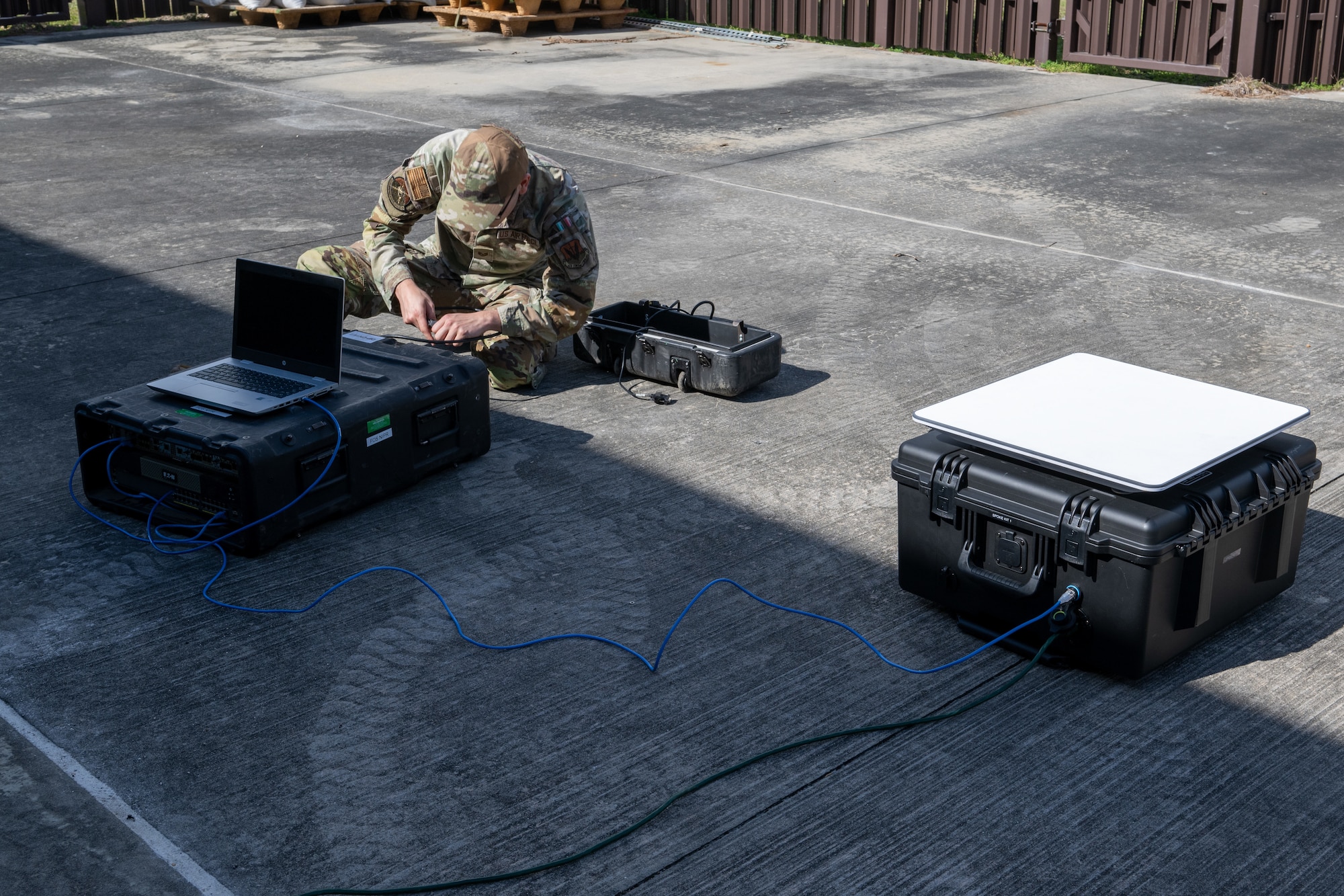 U.S. Air Force Staff Sgt. Chase Jordan- Alcañiz, 23rd Communications Squadron network infrastructure non-commissioned officer in charge, sets up a Star Shield satellite communications system at Moody Air Force Base, Georgia, Feb. 12, 2025. Moody AFB is the first base in the Air Force to use VPN into Star Shield, connecting Airmen to Moody AFB’s networks in austere locations. (U.S. Air Force photo by Airman 1st Class Iain Stanley)
