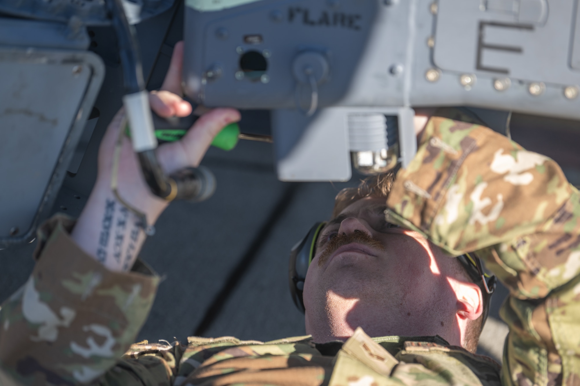 A U.S. Air Force Airman assigned to the 23rd Maintenance Squadron installs a 3D-printed component to an HH-60W Jolly Green II at Moody Air Force Base, Georgia, Nov. 21, 2024. The use of the 3D printer has eliminated a two-year wait period for the original part. (U.S. Air Force photo by Airman 1st Class Iain Stanley)