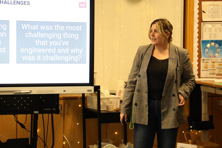 Rachel Napolitan, Chief of Public Affairs, U.S. Army Corps of Engineers – Far East District, discusses different types of engineering careers within USACE with students at Humphreys High School, Camp Humphreys, on Feb. 21, 2025. The speaking series marks the 13th consecutive year of outreach efforts at local schools by the district. It brought together professionals from various engineering disciplines to engage with students and showcase real-world applications of engineering. (U.S. Army photo by Yohan An)