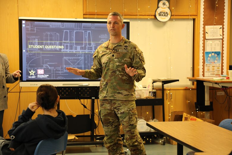 Lt. Col. Robert Howell, Deputy Commander, U.S. Army Corps of Engineers – Far East District, engages with students by answering their questions about military engineering and career opportunities within USACE during a speaking event at Humphreys High School, Camp Humphreys, on Feb. 21, 2025. The outreach effort ensures students are equipped with the knowledge, inspiration, and resources they need to pursue careers in engineering and related fields. (U.S. Army photo by Yohan An)