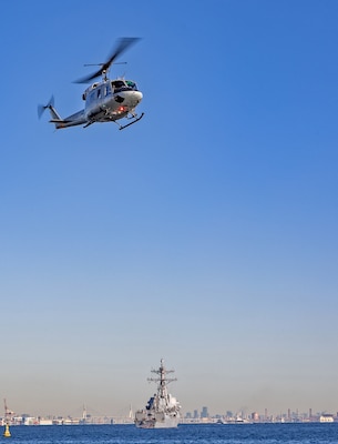 YOKOSUKA, Japan (Feb. 20, 2025) A UH-1N Huey assigned to the 459th Airlift Squadron from Yokota Air Base prepares to land at Commander, Fleet Activities Yokosuka’s helipad in support of an exercise between U.S. Naval Hospital (USNH) Yokosuka and 374th Medical Group from Yokota. USNH Yokosuka and 374th Medical Group conducted a surgical team assist and medical evacuation (MEDEVAC) operation for a joint mass casualty drill. The drill tested the efficiency of transporting a surgeon from Yokosuka to Yokota via 459th Airlift Squadron while simultaneously evacuating a Yokota-based trauma patient to a higher level of care in Yokosuka. (U.S. Navy photo by Daniel Taylor/USNMRTC Yokosuka Public Affairs)