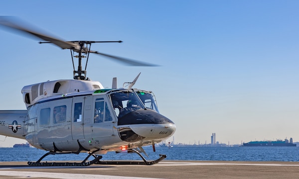 YOKOSUKA, Japan (Feb. 20, 2025) A UH-1N Huey assigned to the 459th Airlift Squadron from Yokota Air Base prepares to depart from Commander, Fleet Activities Yokosuka’s helipad in support of an exercise between U.S. Naval Hospital (USNH) Yokosuka and 374th Medical Group from Yokota. USNH Yokosuka and 374th Medical Group conducted a surgical team assist and medical evacuation (MEDEVAC) operation during a joint mass casualty drill. The drill tested the efficiency of transporting a surgeon from Yokosuka to Yokota via 459th Airlift Squadron while simultaneously evacuating a Yokota-based trauma patient to a higher level of care in Yokosuka. (U.S. Navy photo by Daniel Taylor/USNMRTC Yokosuka Public Affairs)