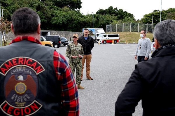 250220-N-DO281-1024 OKINAWA, Japan (Feb. 20, 2025) – Capt. Kathleen Cooperman, commanding officer, Navy Medicine Readiness and Training Command Okinawa speaks to service members and members of the American Legion Riders before a motorcycle safety ride through Okinawa, Japan, Feb. 20, 2025. (U.S. Navy photo by Mass Communication Specialist 1st Class Trey Fowler)