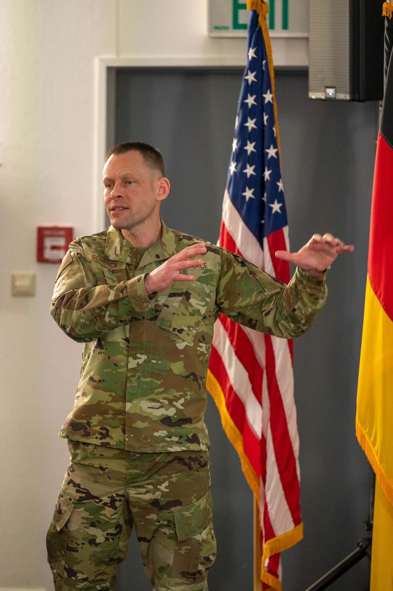U.S. Air Force Col. Jason Schneck, Office of the Assistant Secretary of the Air Force Financial Management and Comptroller budget integration division chief, discusses financial management and budget changes from SAF level leaders during the the USAFE-AFAFRICA 2025 Budget Symposium on Ramstein Air Base, Germany, Feb. 25, 2025. This symposium aimed to bring together flight leaders, budget officers and resources advisors within USAFE-AFAFRICA, to provide centralized guidance and direction for SAF/FM and USAFE-AFAFRICA funding strategies.