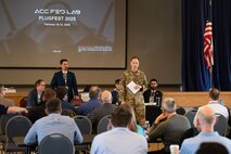 U.S. Air Force Lt. Col. Nathan Maertens, Chief of Staff, 9th Reconnaissance Wing, delivers opening remarks at PlugFest, an event focusing on testing the interoperability of modules and sensors within open standards on Feb. 10, 2025 at Beale Air Force Base, California