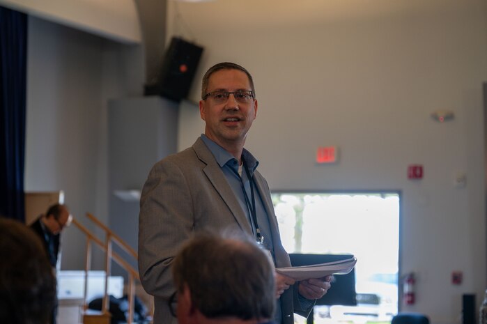 Dr. John D. Matyjas, Air Combat Command Scientific Advisor to Commander, delivers a speech during the opening of PlugFest on Feb. 10, 2025, at Beale Air Force Base, California.