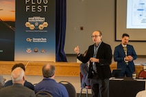 Dr. Ilya Lipkin, Senior Engineer, Air Combat Command Federal Laboratory, delivers remarks during the opening of PlugFest on Feb. 10, 2025, at Beale Air Force Base, California.