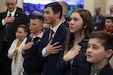 Children say the Pledge of Allegiance prior to the House Veterans, Military Affairs and Public Protection Committee (VMAPP) meeting in the Capitol Annex building as part of the Military Kids day at the Capitol in Frankfort, Feb. 25, 2025. The children were recognized by the legislators during the meeting and each got to introduce themselves and talk about what their parent did in the military and what branch they served in. (U.S. Army National Guard photo by Sgt. 1st Class Benjamin Crane)