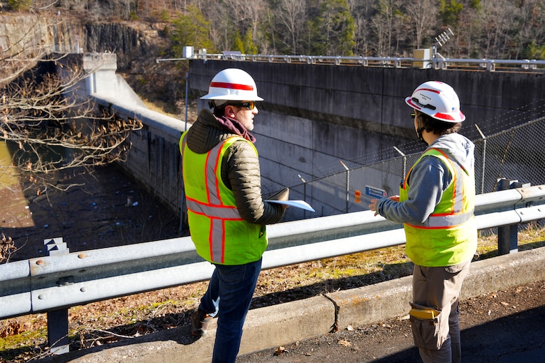 Peter Krembs, U.S. Army Corps of Engineers Nashville District acting dam safety chief (left) and Liz Dodson, USACE Nashville District geologist, discuss observations during a special dam inspection of Martins Fork Dam in Smith, Kentucky on Feb. 25, 2025. The inspection, which found no significant structural concerns, was required after Martins Fork reservoir set a new record for pool elevation after heavy rains passed through the region.