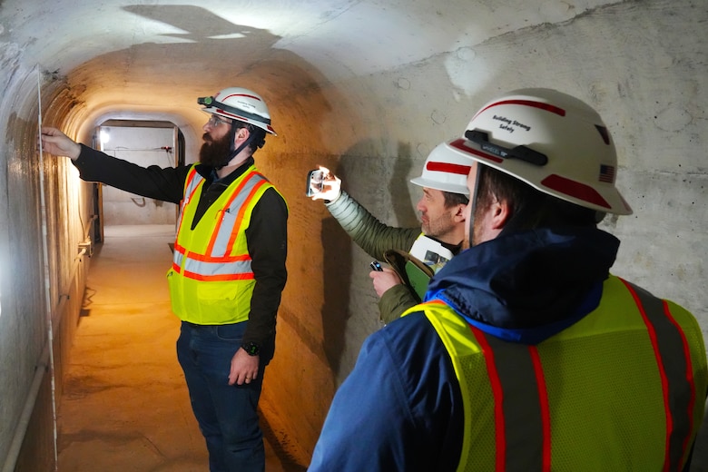 A.Y. York, civil engineer with the U.S. Army Corps of Engineers Nashville District (left), takes a measurement on the wall during a special dam inspection of Martins Fork Dam in Smith, Kentucky on Feb. 25, 2025. The inspection, which found no significant structural concerns, was required after Martins Fork reservoir set a new record for pool elevation after heavy rains passed through the region.