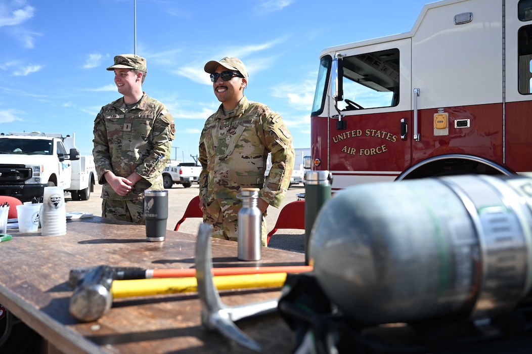 U.S. Air Force 2nd Lt. Jackson Arms, 17th Civil Engineer Squadron officer, and Staff Sgt. Omar Colmenero, 312th Training Squadron Louis F. Garland Department of Defense Fire Academy instructor, talk with local high school students at the SPARK Youth Career Expo, Foster Communication Coliseum, San Angelo, Feb. 26, 2025. The expo served as a platform for recruitment, but more importantly, it strengthened Goodfellow’s ongoing community partnership with the Concho Valley. (U.S. Air Force photo by Senior Airman Madi Collier)