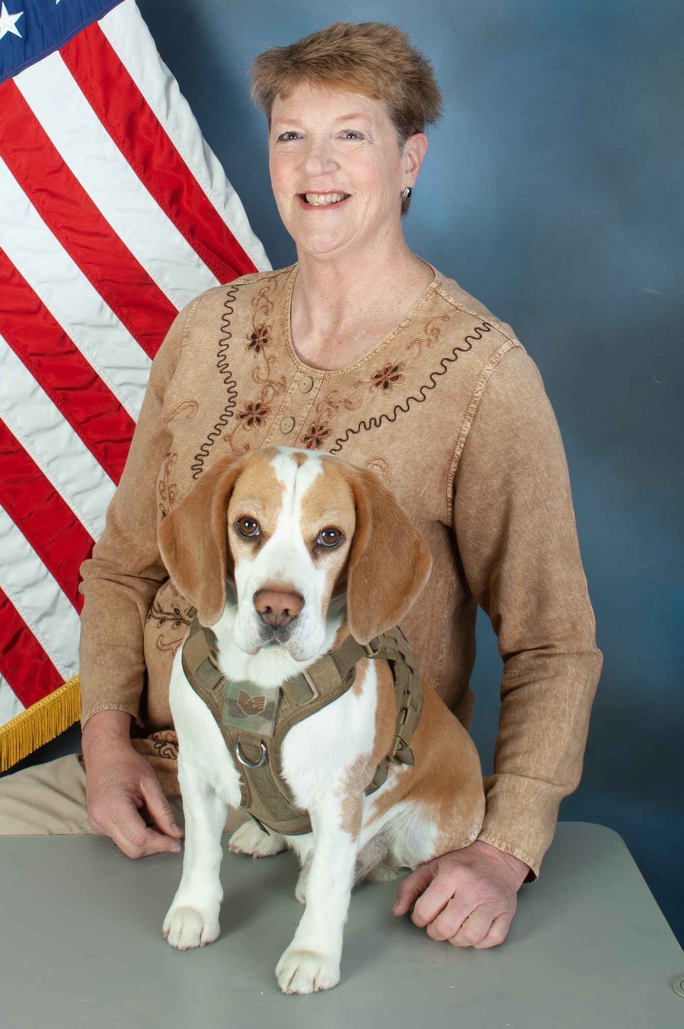 Official photo of female with a dog