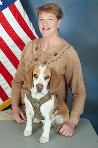 Official photo of female with a dog