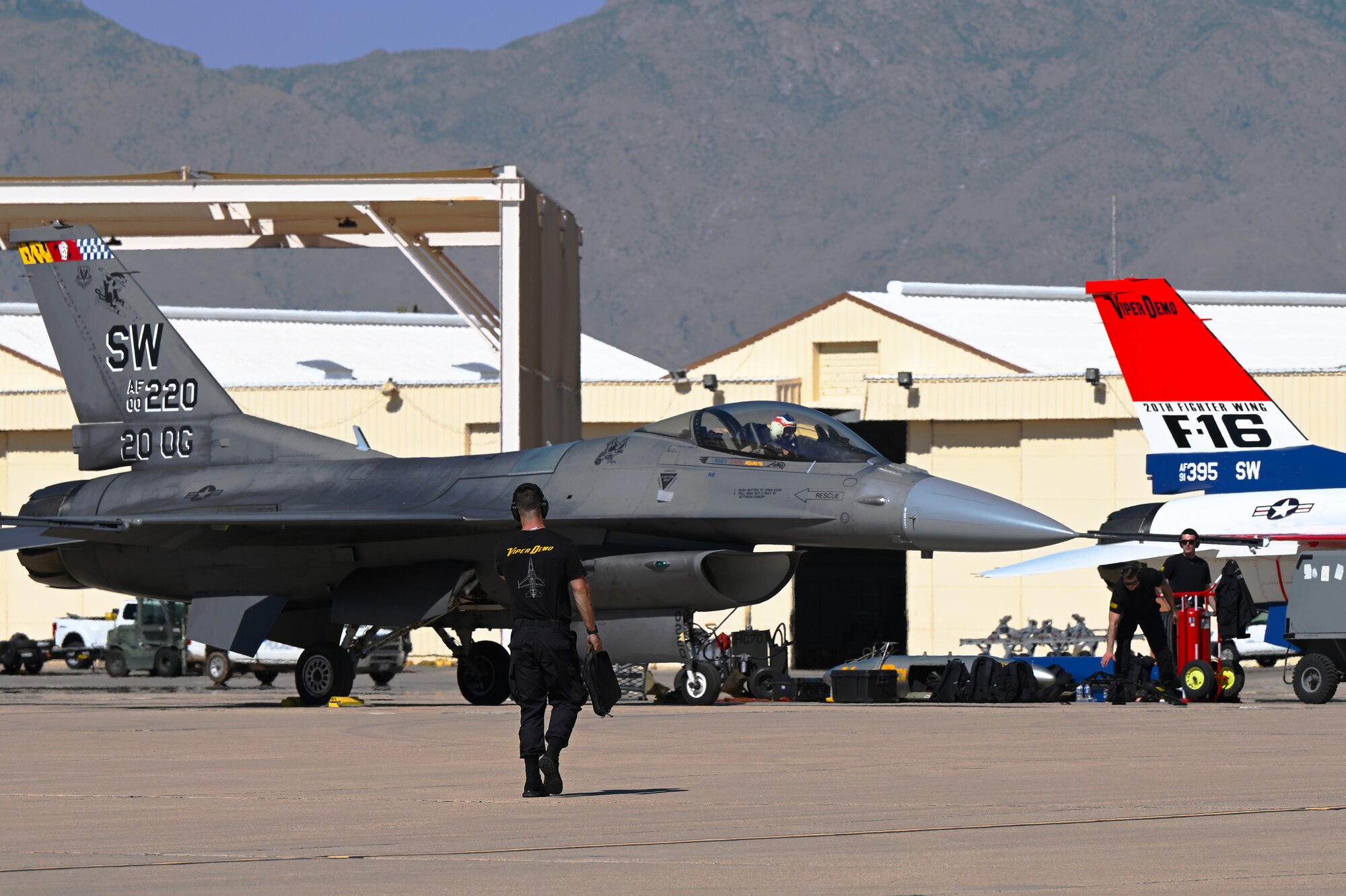 The U.S. Air Force F-16 Viper Demonstration Team performs maintenance on the aircraft before takeoff during Heritage Flight Training Course at Davis-Monthan Air Force Base, Arizona, Feb. 27, 2025. The F-16 Fighting Falcon is a compact, multi-role, highly maneuverable fighter aircraft and has proven itself in air-to-air combat and air-to-surface attack. (U.S. Air Force photo by Senior Airman Andrew Garavito)