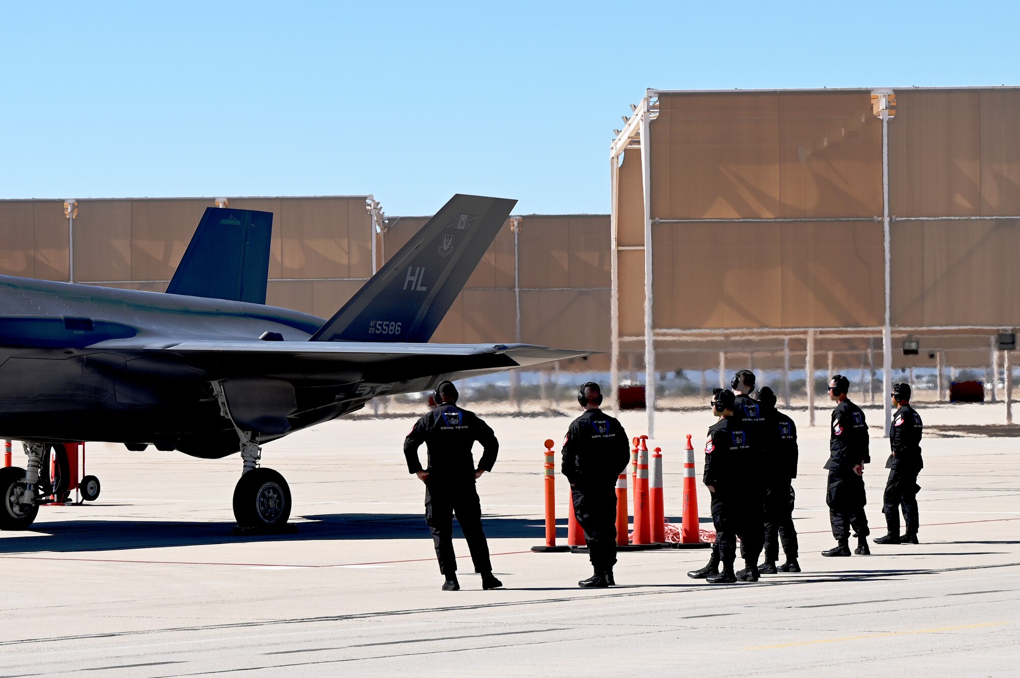 The U.S. Air Force F-35A Lightning II Demonstration Team prepares to inspect the aircraft before flight during Heritage Flight Training Course at Davis-Monthan Air Force Base, Arizona, Feb. 27, 2025. The F-35’s advanced sensor package is designed to gather, fuse and distribute more information than any fighter in history, giving operators a decisive advantage over all adversaries. (U.S. Air Force photo by Senior Airman Andrew Garavito)