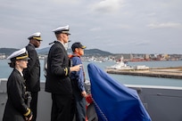 The Commanding Officer of the San Antonio-class amphibious transport dock ship USS San Diego (LPD 22), Capt. Timothy Carter (back left), stands alongside the Ishigaki harbor pilot and his bridge watch team as the ship arrives in Ishigaki, Japan, Feb. 26.