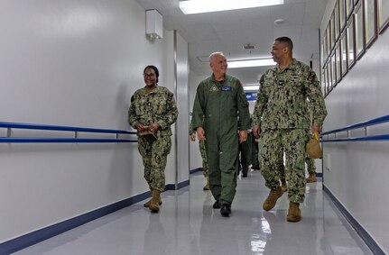 U.S. Naval Hospital (USNH) Yokosuka Executive Officer, Capt. Richard Gillard discusses the capabilities of the hospital with Commander, Naval Air Forces Vice Adm. Daniel Cheever during a tour of USNH Yokosuka.