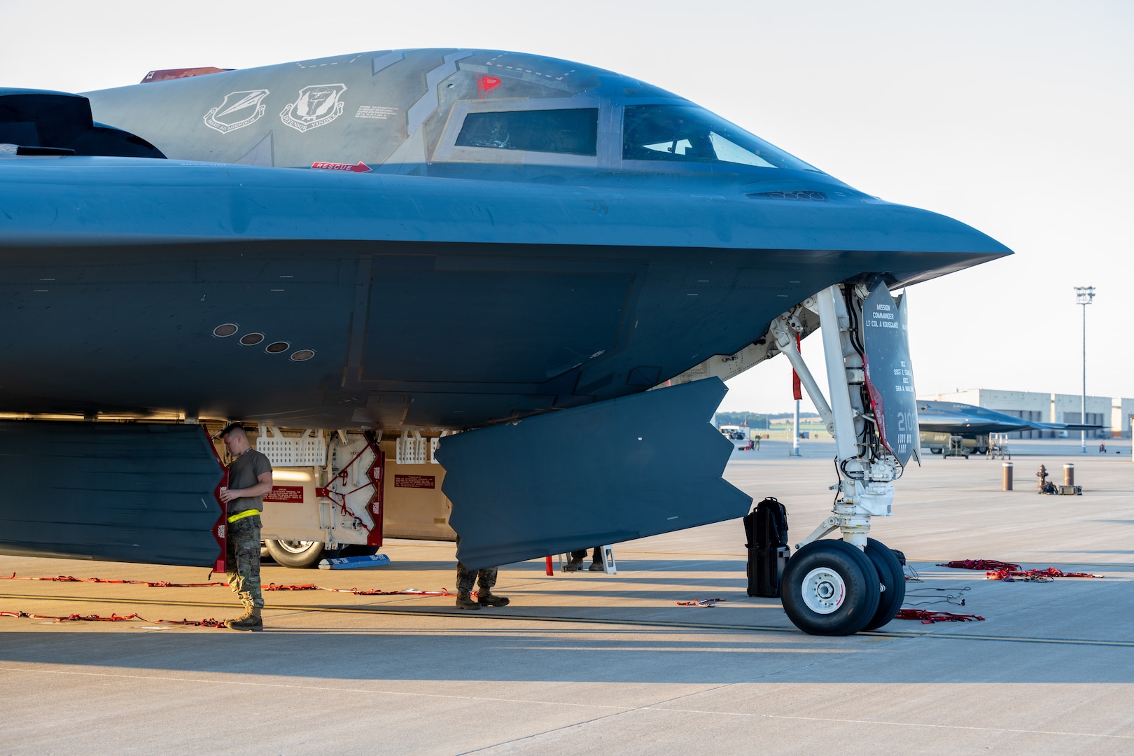 U.S. Airmen from the 393d Bomber Generation Squadron inspect and secure protective covering on the B-2 Spirit stealth bomber at Whiteman Air Force Base, Mo., July 25, 2024.