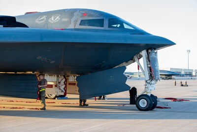 U.S. Airmen from the 393d Bomber Generation Squadron inspect and secure protective covering on the B-2 Spirit stealth bomber at Whiteman Air Force Base, Mo., July 25, 2024.