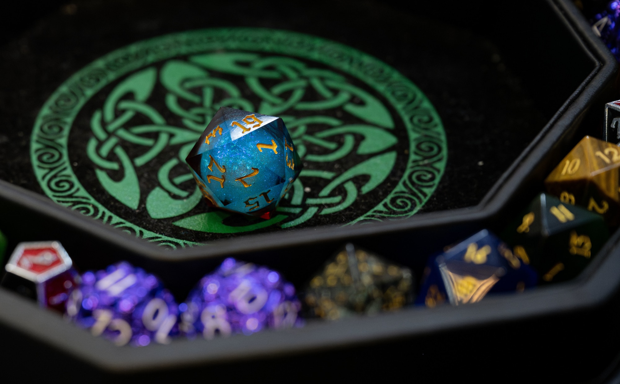A die rests in the center of a dice rolling mat at RAF Mildenhall, England, Feb. 26, 2025.