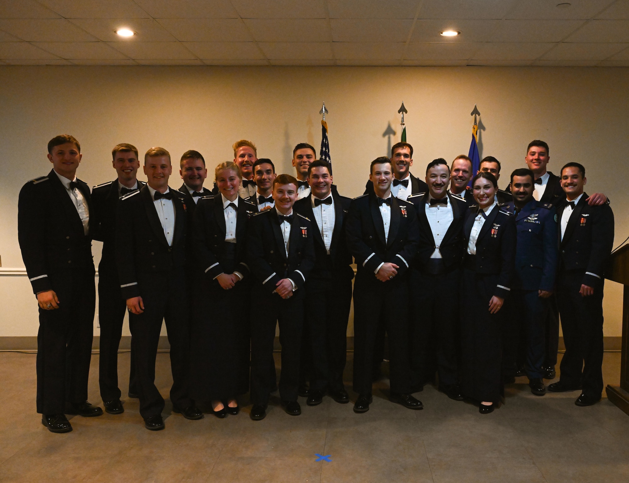 U.S. Air Force Airmen from graduating Class 25-06 pose for a group photo at Laughlin Air Force Base, Texas, Feb. 27, 2025. nineteen U.S. Air Force officers were awarded silver wings during the ceremony, symbolizing their completion of the Undergraduate Pilot Training program. (U.S. Air Force photo by Airman 1st Class Harrison Sullivan)