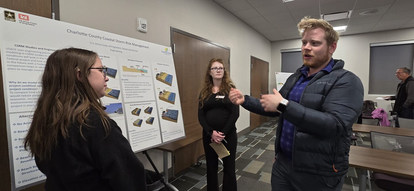 U.S. Army Corps of Engineers (USACE) Jacksonville District Economist Evan Jonson explains variables under consideration during the Charlotte County Coastal Storm Risk Management (CSRM) Study to a reporter from The Daily Sun, a Charlotte County publication.