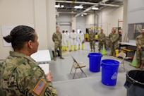 250226-N-FD648-1073 WRIGHT PATTERSON AFB, OH – U.S. Army Brig. Gen. Tanya McGonegal, Joint Task Force - Civil Support, commander, speaks to an Air Force Radiation Assessment Team training class at Wright-Patterson AFB, Ohio, Feb. 26, 2025. The JTF-CS commander met with AFRAT to better understand its partnership and strengthen their relationship as interagency partners. (U.S. Navy photo by Mass Communication Specialist 2nd Class Ryan Walvoord)