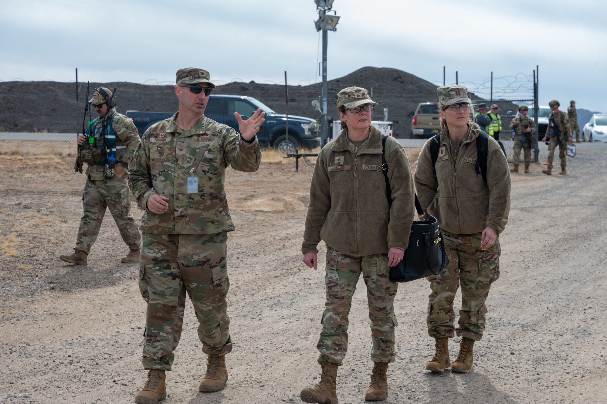 U.S. Air Force Col. Thane Sisson, 377th Air Base Wing Maintenance Group commander, tour Maj. Gen. Stacy Huser, Air Force Global Strike commander and U.S. Air Force Capt. Brittany Talbot, Air Force Global Strike Aide-De-Camp around the incident-site, Feb. 26, in Santa Fe, N.M. The exercise serves as a vital opportunity for the Department of Defense and its mission partners to strengthen their collective preparedness, refine response protocols, and enhance interoperability in the face of complex incident scenarios, ensuring that military and civilian agencies can seamlessly collaborate. (U.S. Air Force photo by Airman 1st Class Donnell Schroeter)