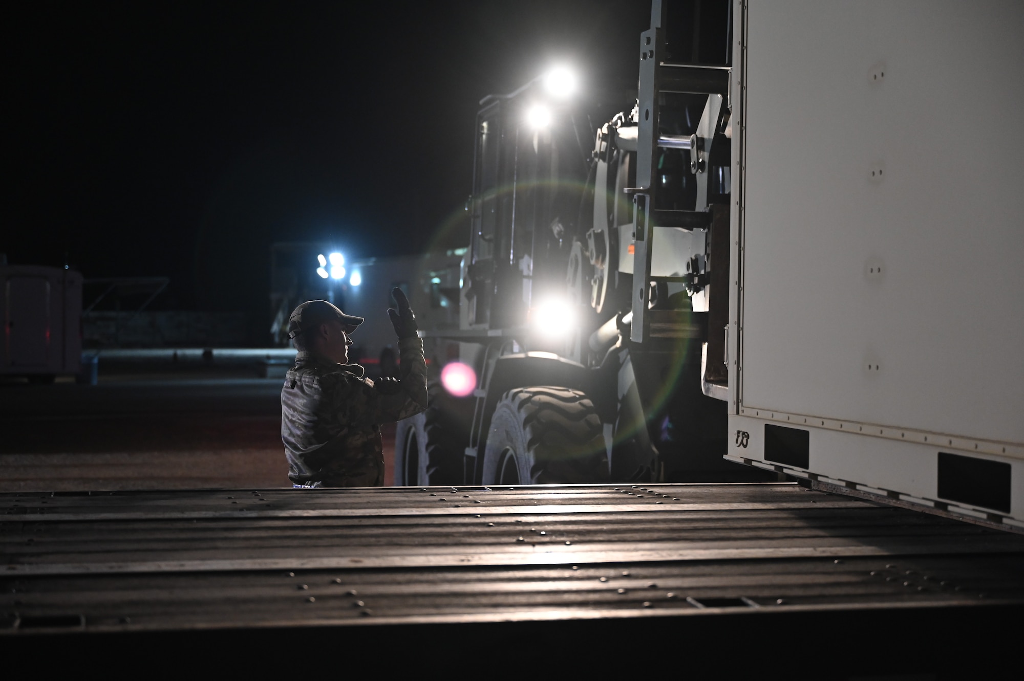 Staff Sgt. James Cambell, 377th Logistic Readiness Squadron staging area team lead, supervises the unloading of essential equipment during an incident response exercise on Feb. 25 in Santa Fe, N.M. As part of the exercise, Weidner ensures the smooth and efficient operation of logistics operations, contributing to the Department of Defense's preparedness. The exercise brings together local, state, and federal agencies to improve coordination and enhance joint response capabilities. Weidner’s expertise in managing ground transportation plays a vital role in maintaining the flow of necessary resources, emphasizing the importance of operational readiness and teamwork in handling emergency response. (U.S. Air Force photo by Airman 1st Class Donnell Schroeter)