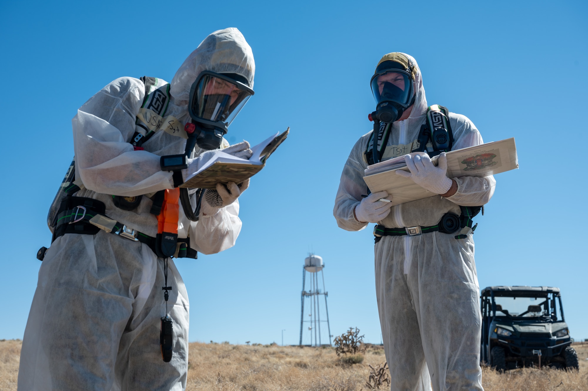 Members of the 377th Air Base Wing Mission Support Group Explosive Ordinance Disposal team document site data during an incident response exercise, Feb. 25, in Santa Fe, N.M. The EOD technicians play a critical role in ensuring the safety of response personnel by conducting initial site surveys, collecting evidence, and mitigating hazards. The training reinforces joint interoperability and readiness to respond to real-world emergencies. (U.S. Air Force photo by Airman 1st Class Donnell Schroeter)