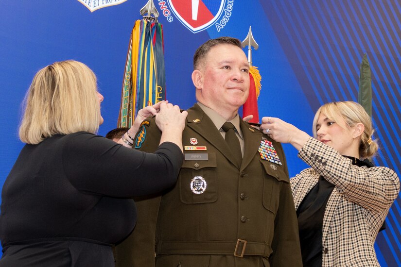 Maj. Gen. John Pippy's family members pin on his new rank during a ceremony Feb. 28, 2025, at Fort Indiantown Gap, Pa. During the ceremony, Pippy was promoted to his current rank, and Pennsylvania Gov. Josh Shapiro swore in Pippy as Pennsylvania’s 55th adjutant general. (Pennsylvania National Guard photo by Wayne V. Hall)