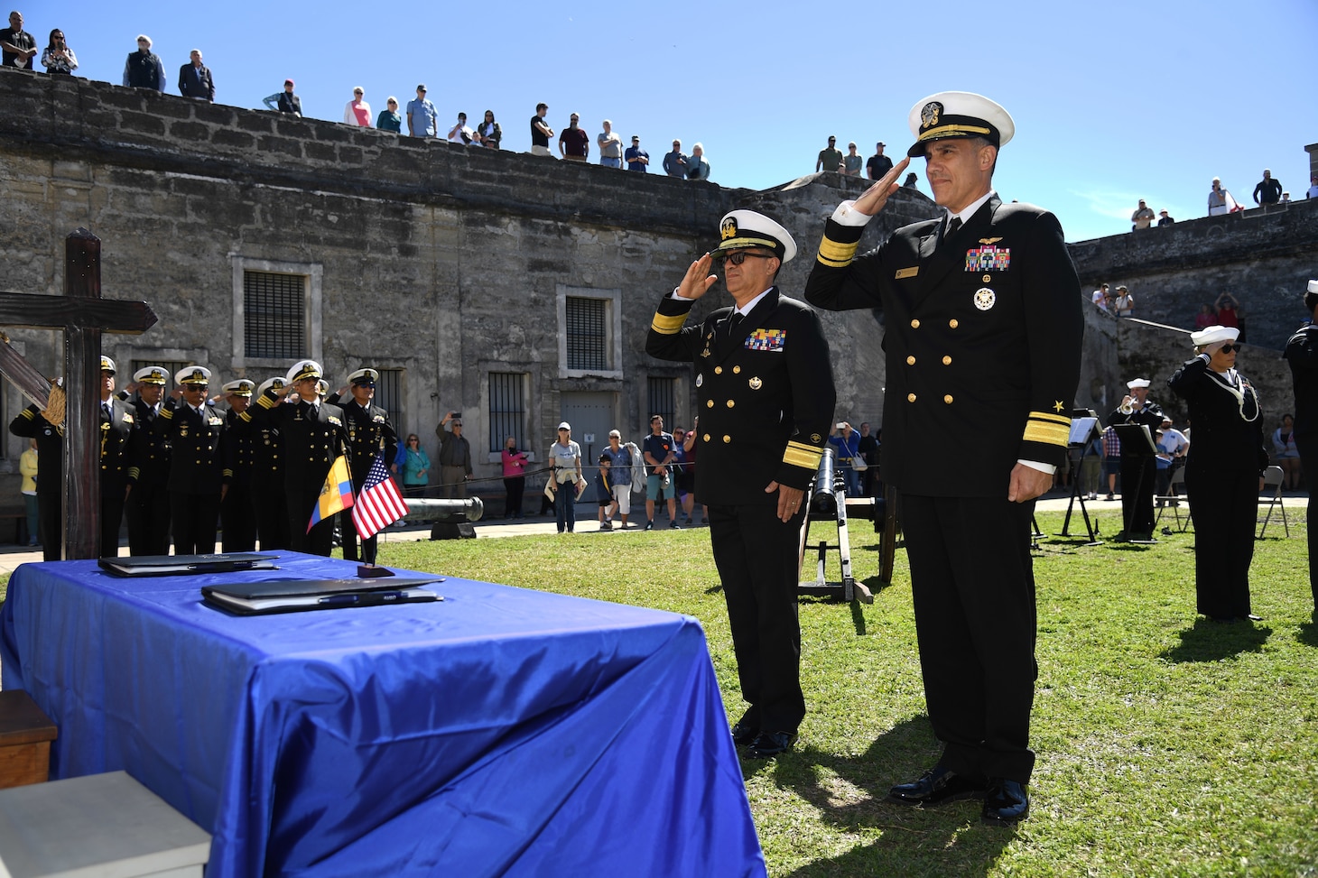 Ecuadorian Rear Adm. Luis Eduardo Piedra, General Inspector of the Ecuadorian Navy, left, and Rear Adm. Carlos Sardiello, Commander, U.S. Naval Forces Southern Command/U.S. 4th Fleet, right, render hand salutes during the playing of the Ecuadorian and U.S. national anthems at the closing ceremony of the U.S.-Ecuador Maritime Staff Talks at Castillo de San Marcos National Monument in St. Augustine, Fla., February 28, 2025. Maritime Staff Talks (MST) serve as an annual comprehensive engagement venue to program, direct, and coordinate all maritime activities between the U.S. and Partner Nations. The overarching MST objective is to increase coordination and integration across the U.S. maritime services and Partner Nations to plan and conduct theater-level security cooperation in order to provide combatant commanders more effective and efficient maritime force packages. U.S. Naval Forces Southern Command/U.S. 4th Fleet is the trusted maritime partner for Caribbean, Central and South America maritime forces leading to improved unity, security and stability. (U.S. Navy photo by Mass Communication Specialist First Class Steven Khor/Released)