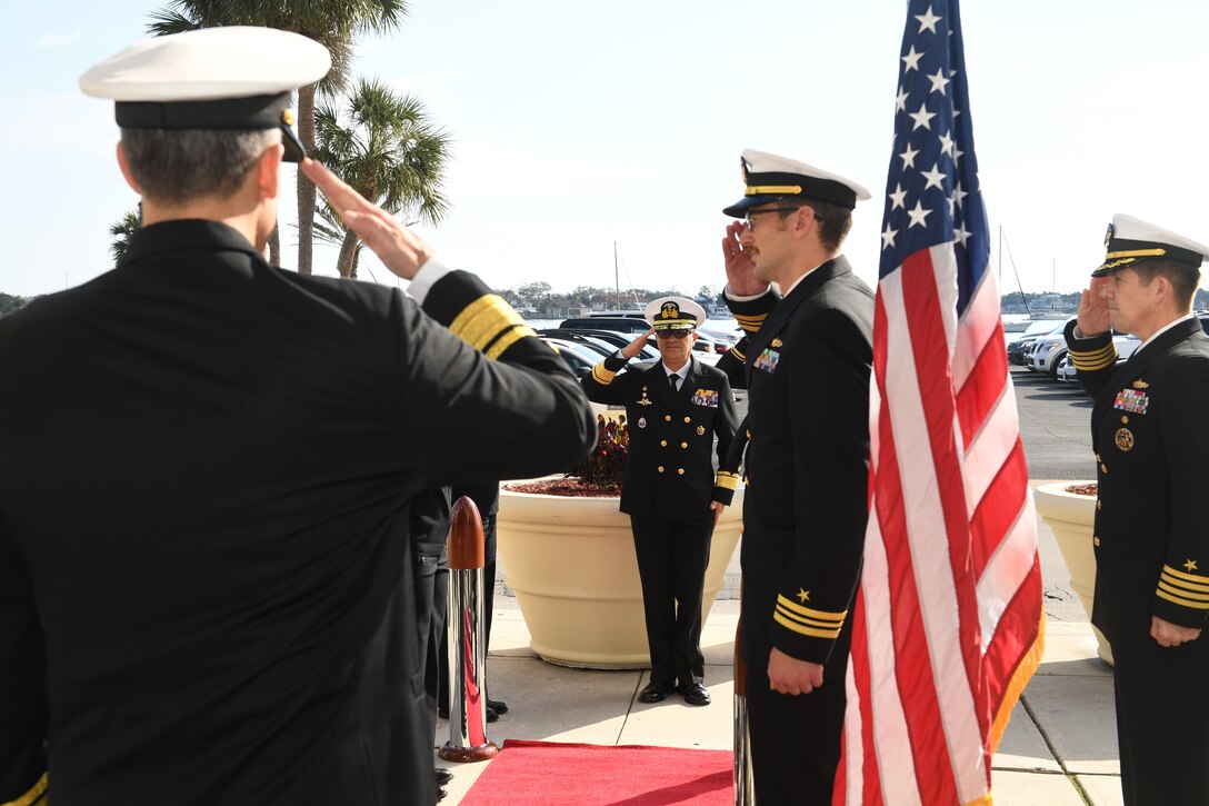Rear Adm. Carlos Sardiello, Commander, U.S. Naval Forces Southern Command/U.S. 4th Fleet, left, renders a salute during honors, welcoming Ecuadorian Rear Adm. Luis Eduardo Piedra, General Inspector of the Ecuadorian Navy, center, as the official beginning of the U.S.-Ecuador Maritime Staff Talks at the historic St. Francis Barracks, now headquarters building of the Florida National Guard, in St. Augustine, Fla., February 27, 2025. Maritime Staff Talks (MST) serve as an annual comprehensive engagement venue to program, direct, and coordinate all maritime activities between the U.S. and Partner Nations. The overarching MST objective is to increase coordination and integration across the U.S. maritime services and Partner Nations to plan and conduct theater-level security cooperation in order to provide combatant commanders more effective and efficient maritime force packages. U.S. Naval Forces Southern Command/U.S. 4th Fleet is the trusted maritime partner for Caribbean, Central and South America maritime forces leading to improved unity, security and stability. (U.S. Navy photo by Mass Communication Specialist First Class Steven Khor/Released)