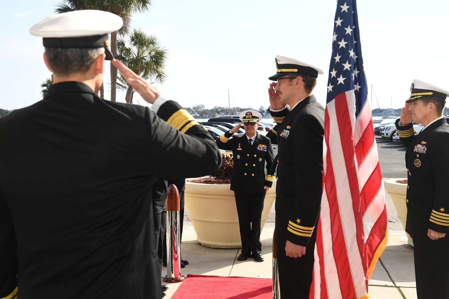 Rear Adm. Carlos Sardiello, Commander, U.S. Naval Forces Southern Command/U.S. 4th Fleet, left, renders a salute during honors, welcoming Ecuadorian Rear Adm. Luis Eduardo Piedra, General Inspector of the Ecuadorian Navy, center, as the official beginning of the U.S.-Ecuador Maritime Staff Talks at the historic St. Francis Barracks, now headquarters building of the Florida National Guard, in St. Augustine, Fla., February 27, 2025. Maritime Staff Talks (MST) serve as an annual comprehensive engagement venue to program, direct, and coordinate all maritime activities between the U.S. and Partner Nations. The overarching MST objective is to increase coordination and integration across the U.S. maritime services and Partner Nations to plan and conduct theater-level security cooperation in order to provide combatant commanders more effective and efficient maritime force packages. U.S. Naval Forces Southern Command/U.S. 4th Fleet is the trusted maritime partner for Caribbean, Central and South America maritime forces leading to improved unity, security and stability. (U.S. Navy photo by Mass Communication Specialist First Class Steven Khor/Released)
