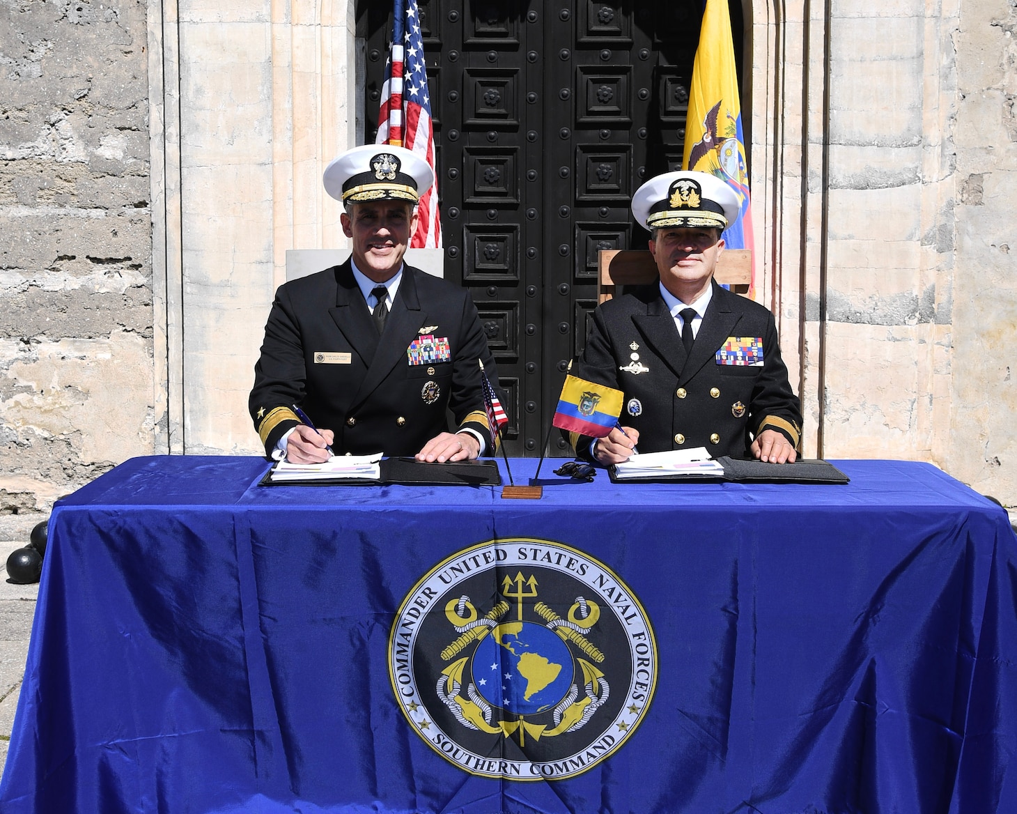 Rear Adm. Carlos Sardiello, Commander, U.S. Naval Forces Southern Command/U.S. 4th Fleet, left, and Ecuadorian Rear Adm. Luis Eduardo Piedra, General Inspector of the Ecuadorian Navy, right, sign the minutes of the U.S.-Ecuador Maritime Staff Talk at Castillo de San Marcos National Monument in St. Augustine, Fla., February 28, 2025. Maritime Staff Talks (MST) serve as an annual comprehensive engagement venue to program, direct, and coordinate all maritime activities between the U.S. and Partner Nations. The overarching MST objective is to increase coordination and integration across the U.S. maritime services and Partner Nations to plan and conduct theater-level security cooperation in order to provide combatant commanders more effective and efficient maritime force packages. U.S. Naval Forces Southern Command/U.S. 4th Fleet is the trusted maritime partner for Caribbean, Central and South America maritime forces leading to improved unity, security and stability. (U.S. Navy photo by Mass Communication Specialist First Class Steven Khor/Released)