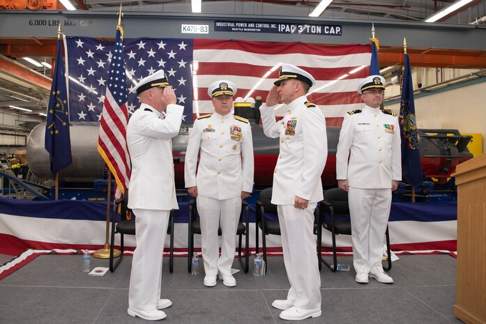 Capt. Jason Weed, commander, Unmanned Undersea Vehicle Squadron (UUVRON) 1, left, and Capt. Jason Geddes salute during a change of command ceremony at Naval Base Kitsap-Keyport, Washington Sept. 25, 2023. During the ceremony, Capt. Jason Geddes, from Indianapolis, relieved Capt. Jason Weed as commander, Unmanned Undersea Vehicle Squadron (UUVRON) 1. (U.S. Navy photo by Mass Communication Specialist 2nd Class Victoria Galbraith)