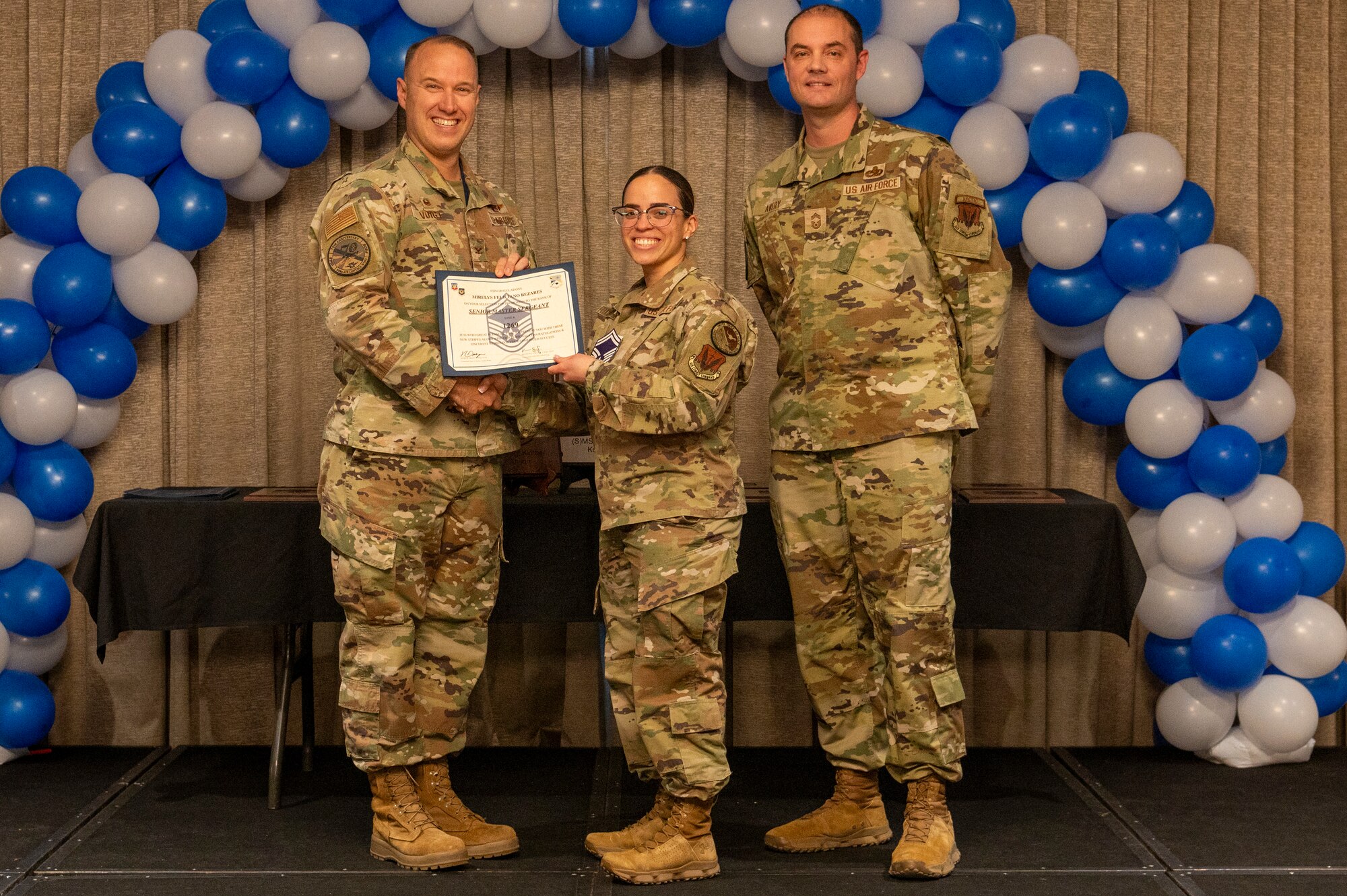 airmen gets promoted on stage