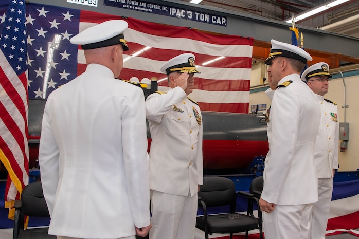 Capt. Jason Geddes salutes Rear Adm. Richard Seif, commander, Submarine Force, U.S. Pacific Fleet during a change of command ceremony at Naval Base Kitsap-Keyport, Washington Sept. 25, 2023. During the ceremony, Capt. Jason Geddes, from Indianapolis, relieved Capt. Jason Weed as commander, Unmanned Undersea Vehicle Squadron (UUVRON) 1. (U.S. Navy photo by Mass Communication Specialist 2nd Class Victoria Galbraith)