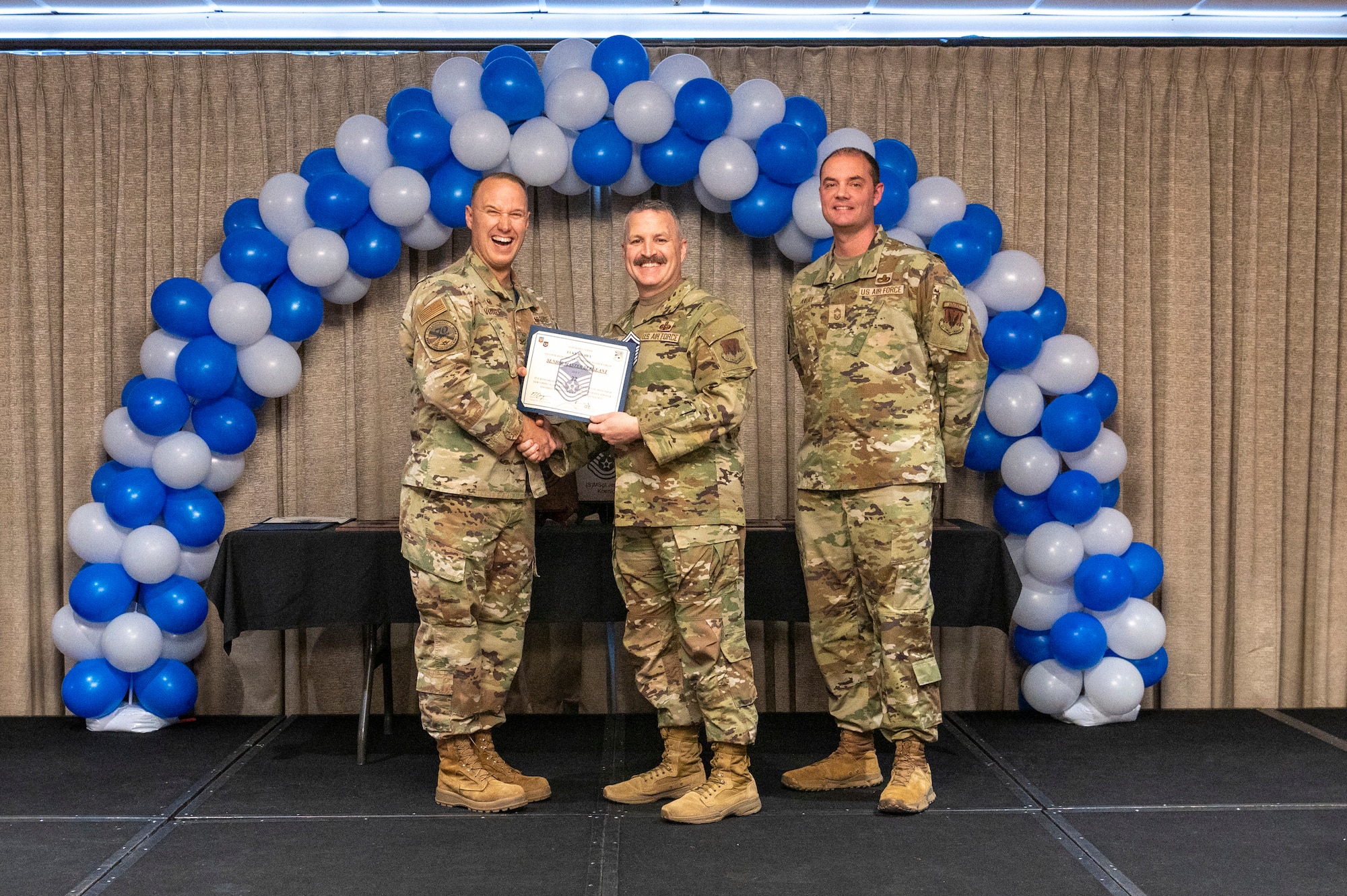 airmen gets promoted on stage