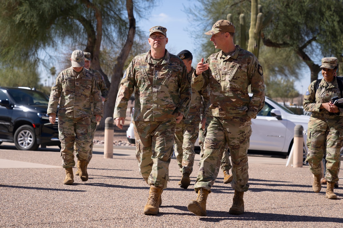 Chief of Space Operations Gen. Chance Saltzman, left, walks with Maj. Gen. David Mineau, right, Air Forces Southern commander, during a visit to AFSOUTH headquarters at Davis-Monthan Air Force Base, Arizona, Feb. 27, 2025. The trip marked Saltzman’s first visit to AFSOUTH where he received a mission brief from local Guardians on their contributions to advancing space capabilities in the U.S. Southern Command area of responsibility. (U.S. Air Force photo by Tech. Sgt. Rachel Maxwell)