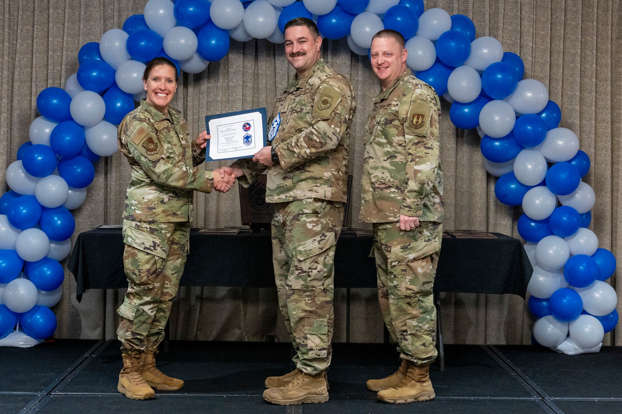 airmen gets promoted on stage