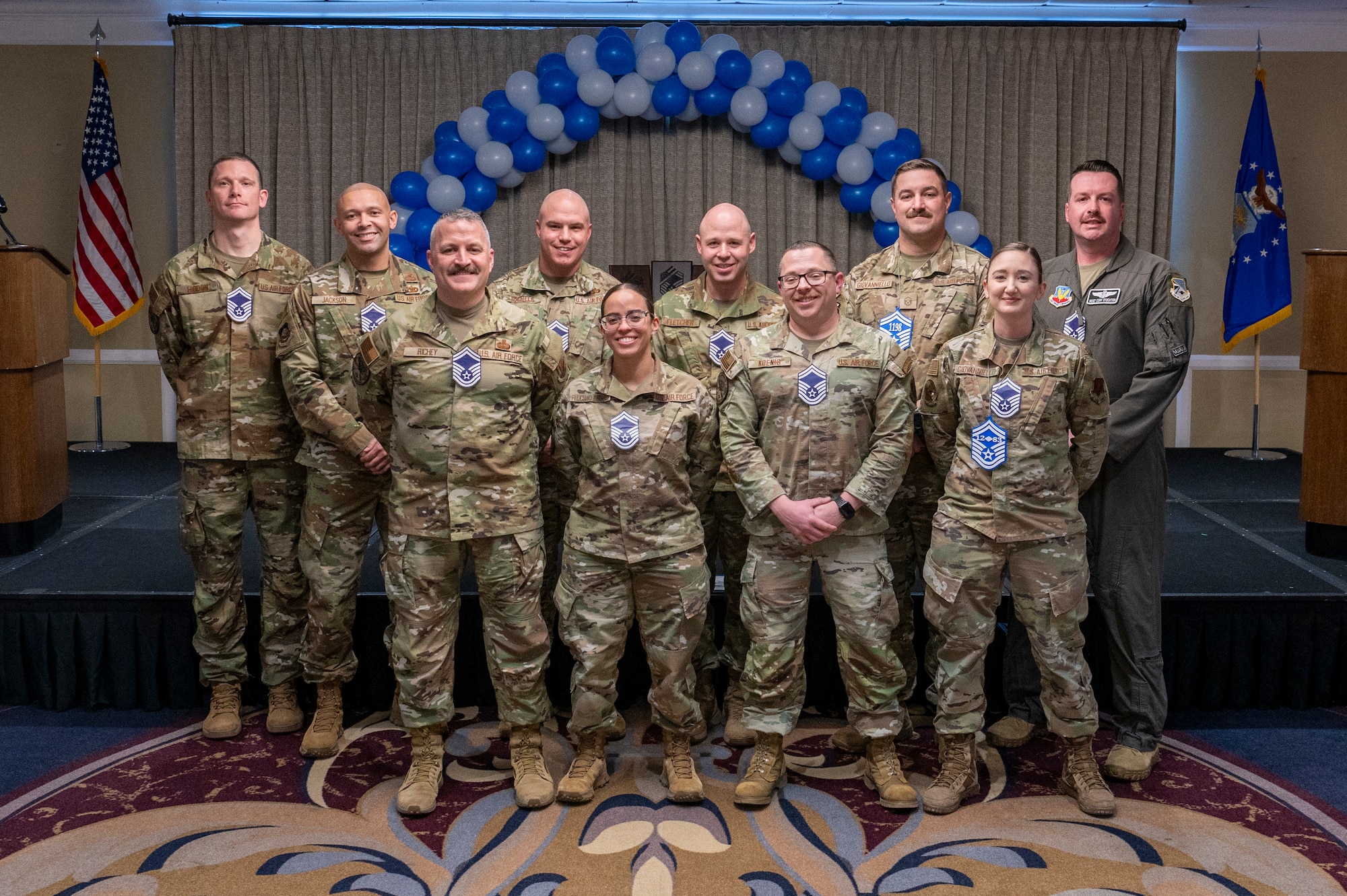 airmen take a photo together