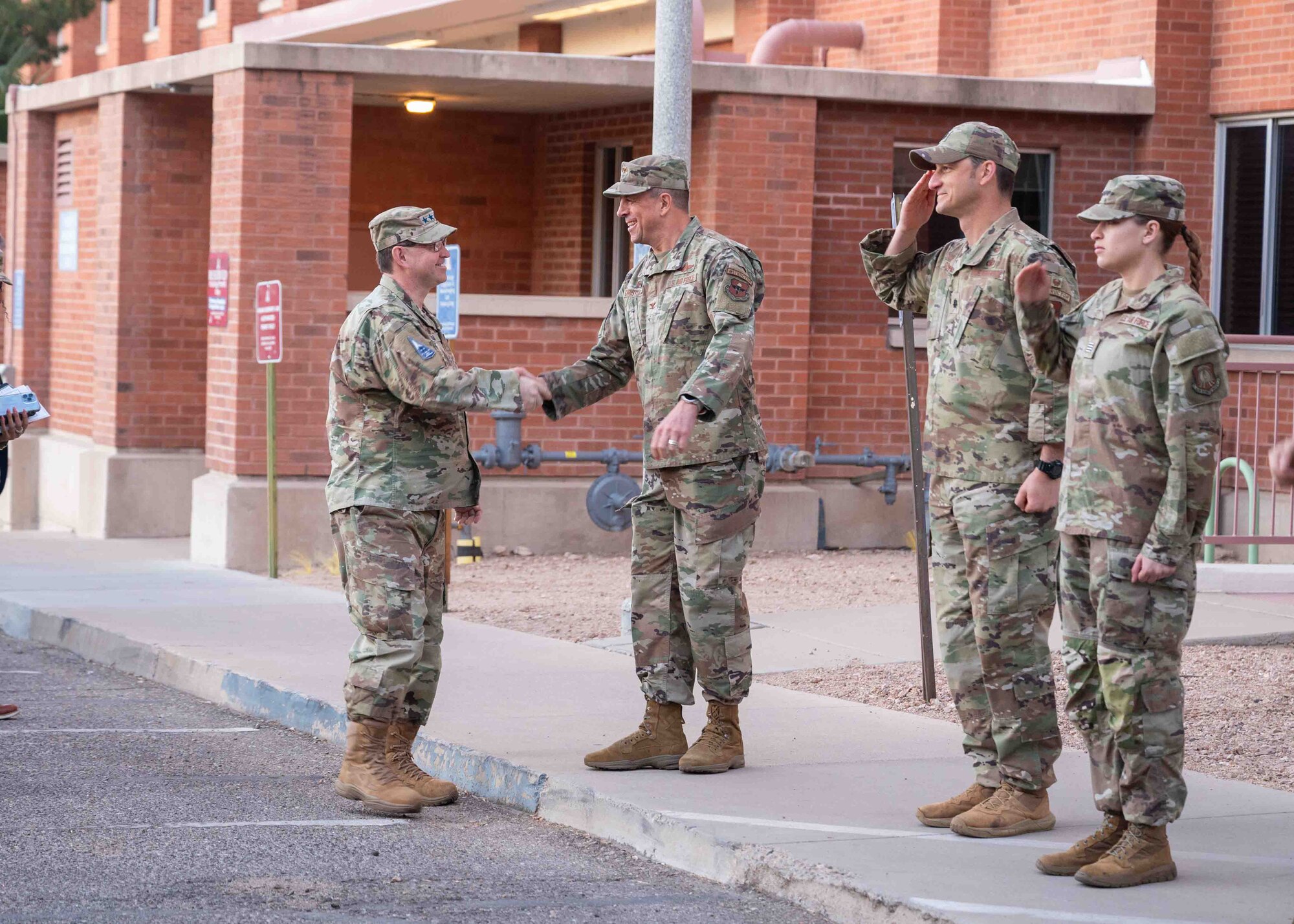 Chief of Space Operations Gen. Chance Saltzman is greeted by U.S. Air Force Col. Cory Christopher, University of Arizona Air Force Reserve Officer Training Corps Detachment 20 Commander, in Tucson, Arizona, Feb. 27, 2025. During his visit to the University of Arizona, Saltzman addressed ROTC members, met with University of Arizona leadership, and visited the ROTC detachment where he spoke with cadets individually. (U.S. Air Force photo by Senior Airman William Finn V)