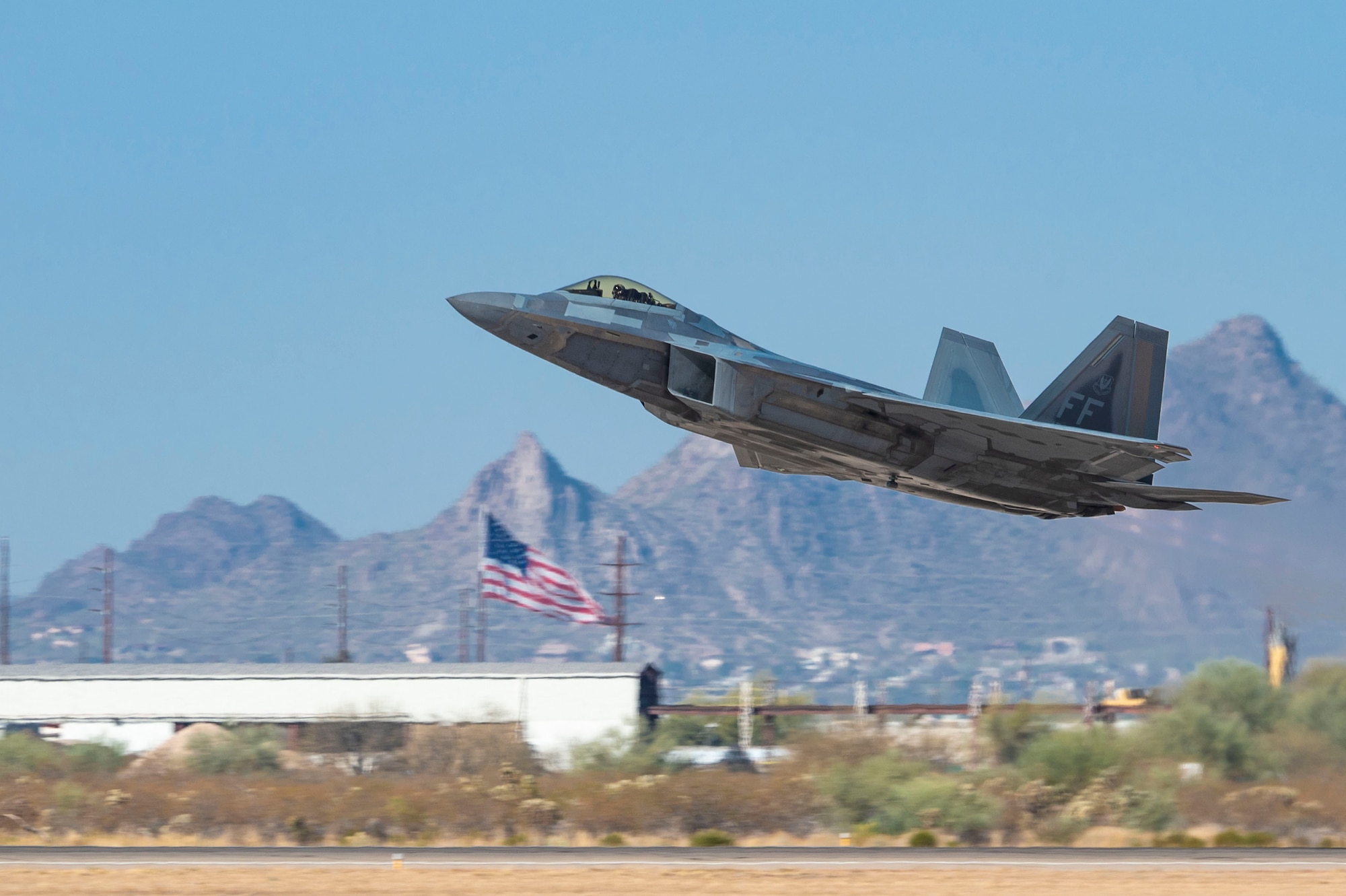 A U.S. Air Force F-22 Raptor aircraft takes off at Davis-Monthan Air Force Base, Arizona, Feb. 28, 2025. The F-22 is capable of executing both air-to-air and air-to-ground missions, enabling the full implementation of operational strategies essential for the Air Force of the 21st century. (U.S. Air Force photo by Airman Samantha Melecio)