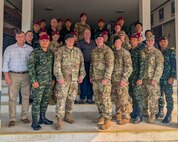 Service members from Royal Thai 1st Special Forces Division and Special Operations Detachment - Pacific pose for a group photo during a Joint Special Operations University Joint Planning Process course and subject matter expert exchange supporting Joint Exercise Cobra Gold 25 in Lop Buri, Kingdom of Thailand, Feb. 21, 2025.