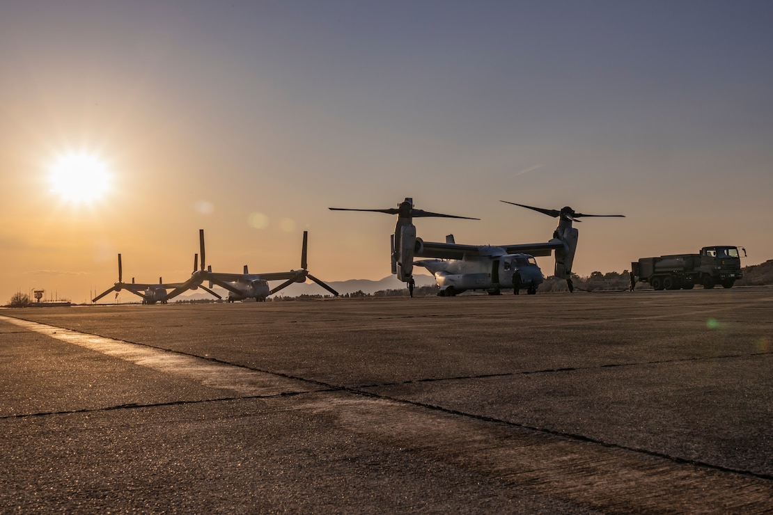 U.S. Marines with Marine Medium Tiltrotor Squadron (VMM) 262 (Rein.), 31st Marine Expeditionary Unit, stage U.S. Marine Corps MV-22B Ospreys assigned to VMM-262 (Rein.), during aerial refuel operations in support of Iron Fist 25, at Japan Ground Self-Defense Force Vice-Camp Takayubaru, Kumamoto, Japan, Feb. 21, 2025.