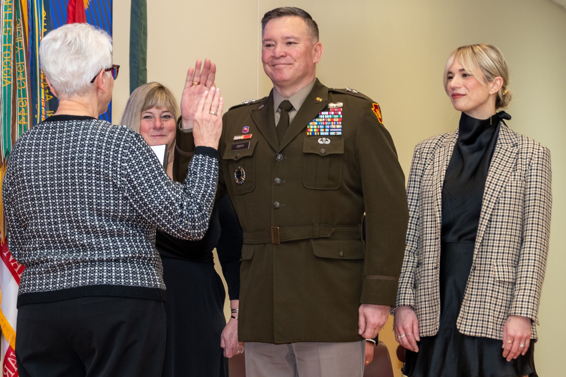 Maj. Gen. (Retired) Jessica L. Wright, left, former U.S. Department of Defense undersecretary of defense for personnel and readiness and the 50th adjutant general of Pennsylvania, promotes Maj. Gen. John Pippy to his current rank during a ceremony Feb. 28, 2025, at Fort Indiantown Gap, Pa. During the ceremony, Pennsylvania Gov. Josh Shapiro swore in Pippy as Pennsylvania’s 55th adjutant general. (Pennsylvania National Guard photo by Wayne V. Hall)
