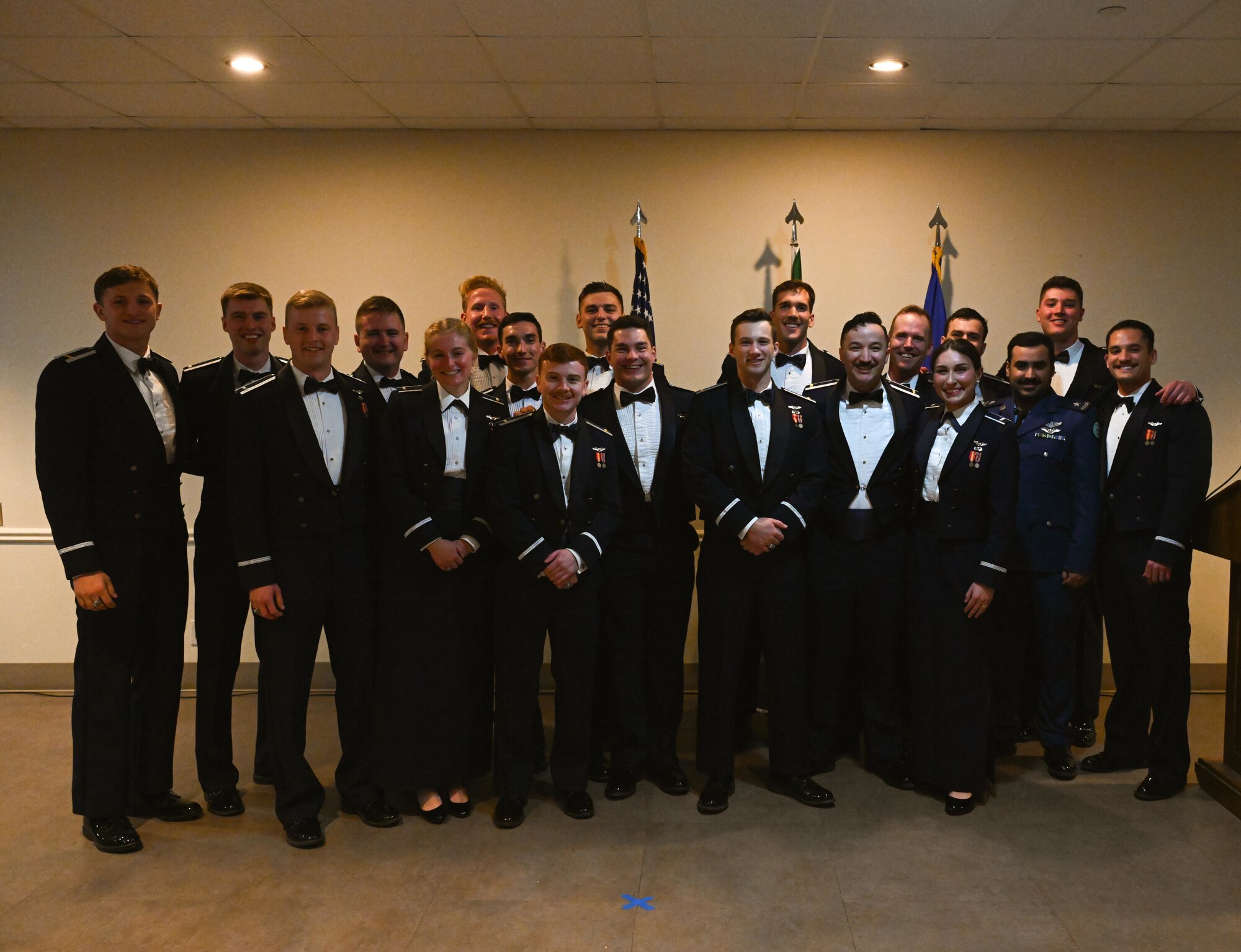 U.S. Air Force Airmen from graduating Class 25-06 pose for a group photo at Laughlin Air Force Base, Texas, Feb. 27, 2025. nineteen U.S. Air Force officers were awarded silver wings during the ceremony, symbolizing their completion of the Undergraduate Pilot Training program. (U.S. Air Force photo by Airman 1st Class Harrison Sullivan)