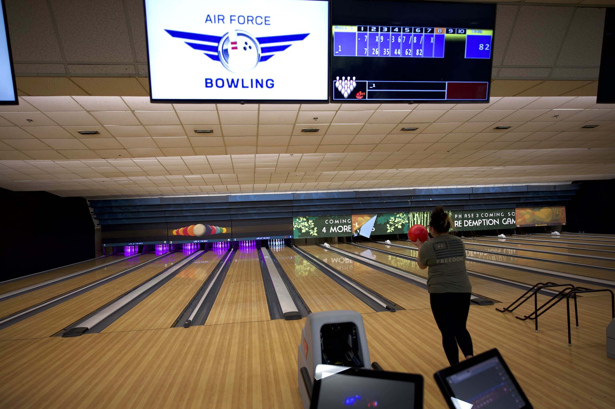 Haili Lombardo, Maxwell Bowling Center recreation aide bowls a practice game before Maxwell Bowling Center opens at Maxwell Air Force Base, Ala. Feb. 26, 2025.